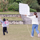 伝統のカビゥトゥで新春親子凧揚げ大会